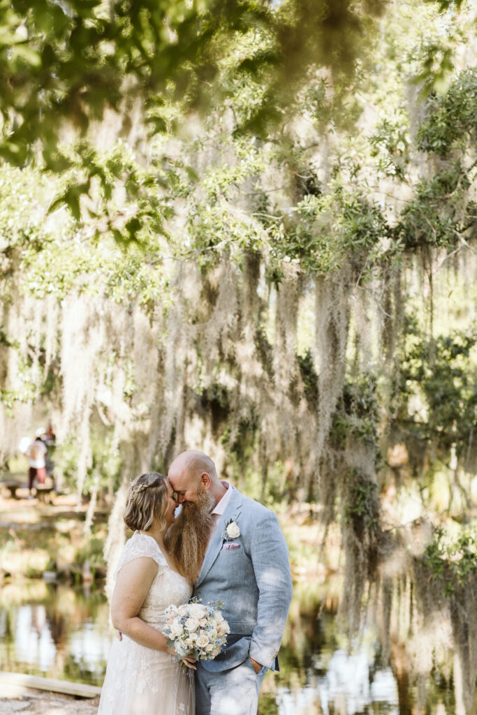 Newlyweds pose after their elopement in New Orleans City Park