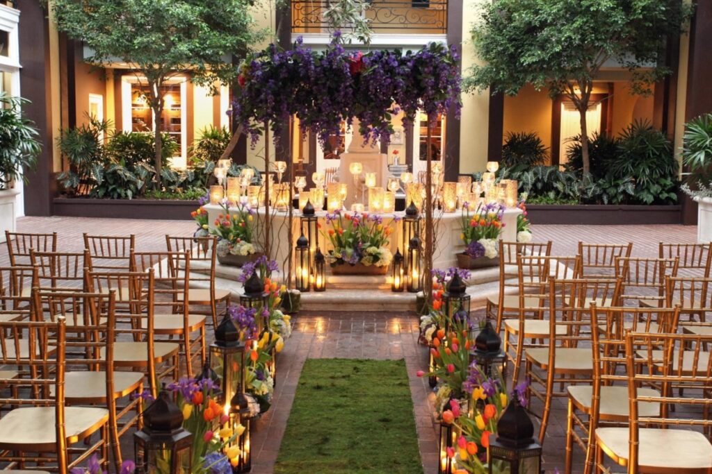 Wedding ceremony setup in the courtyard of Hotel Mazarin in New Orleans