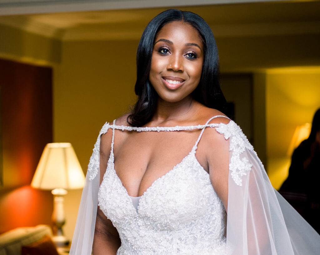 bride poses in her wedding dress